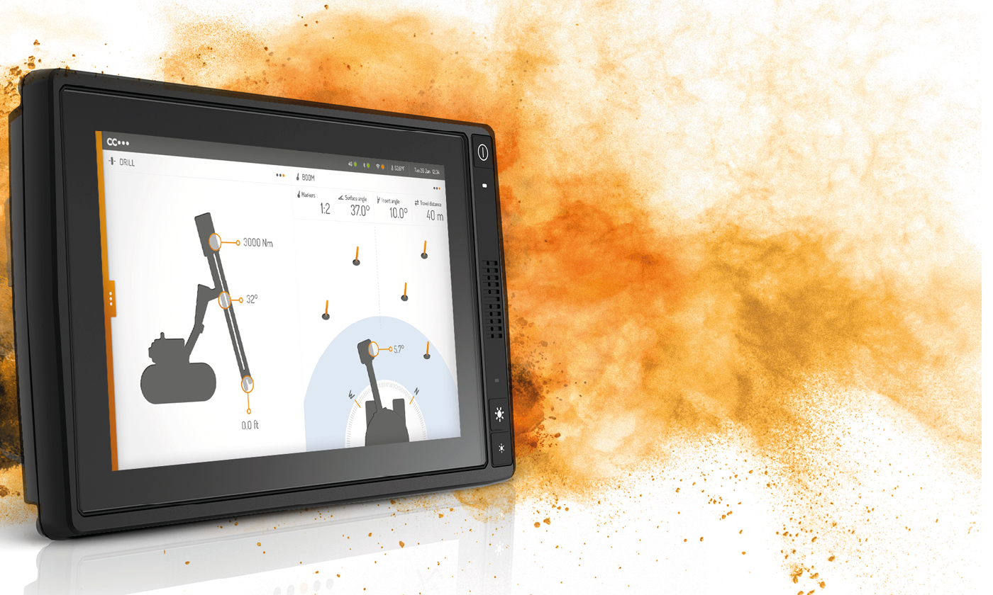 CCpilot X900 display computer in orange dust cloud.