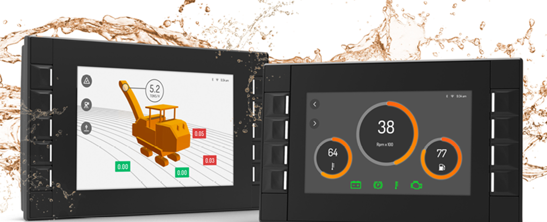 Two display computers beside each other with orange water splash 