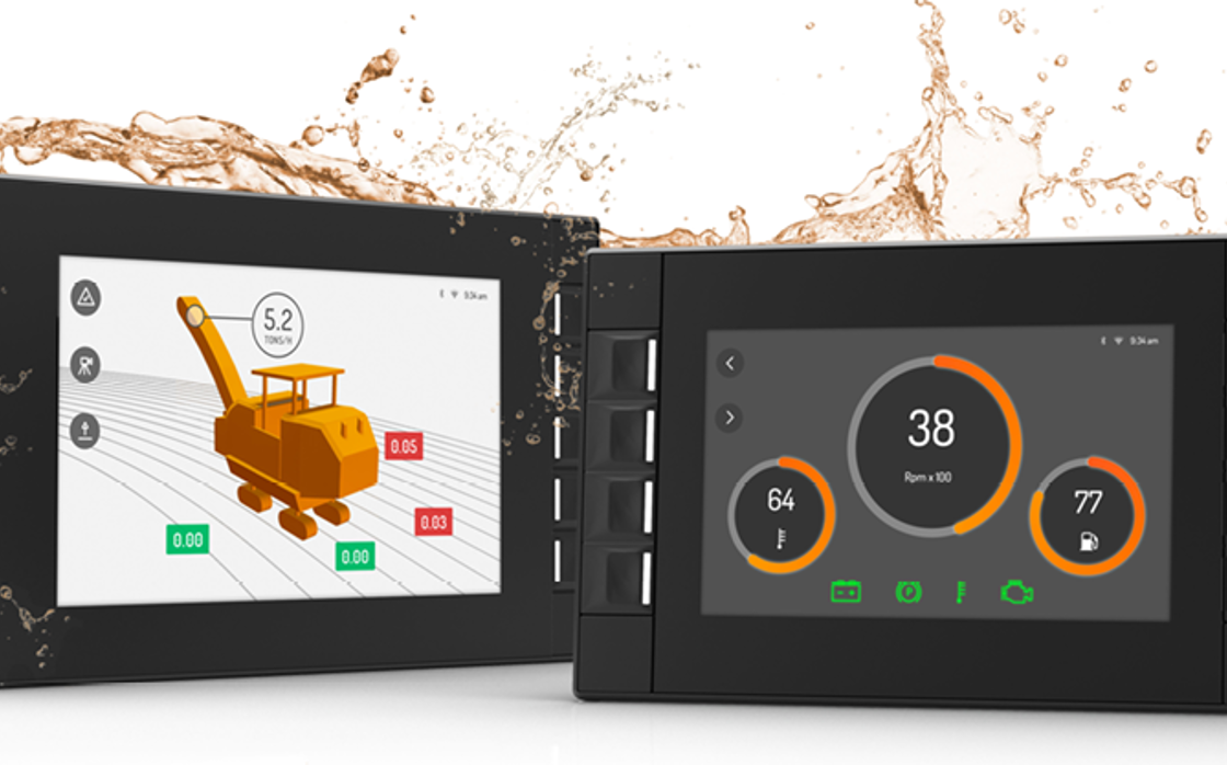 Two display computers beside each other with orange water splash 