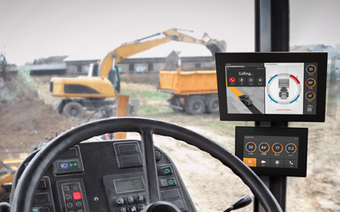 Tractor cabin with two display computers with construction GUI