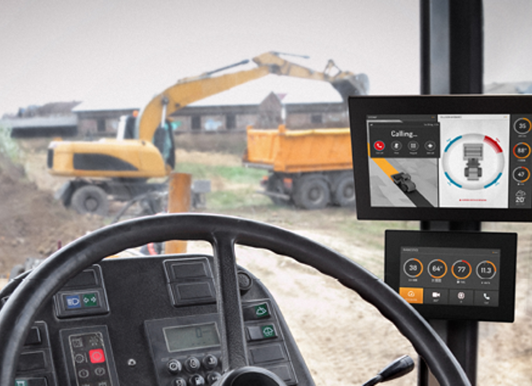 Tractor cabin with two display computers with construction GUI