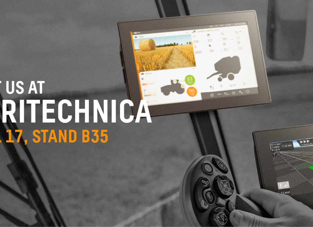 Two display computers in agricultural machine cabine