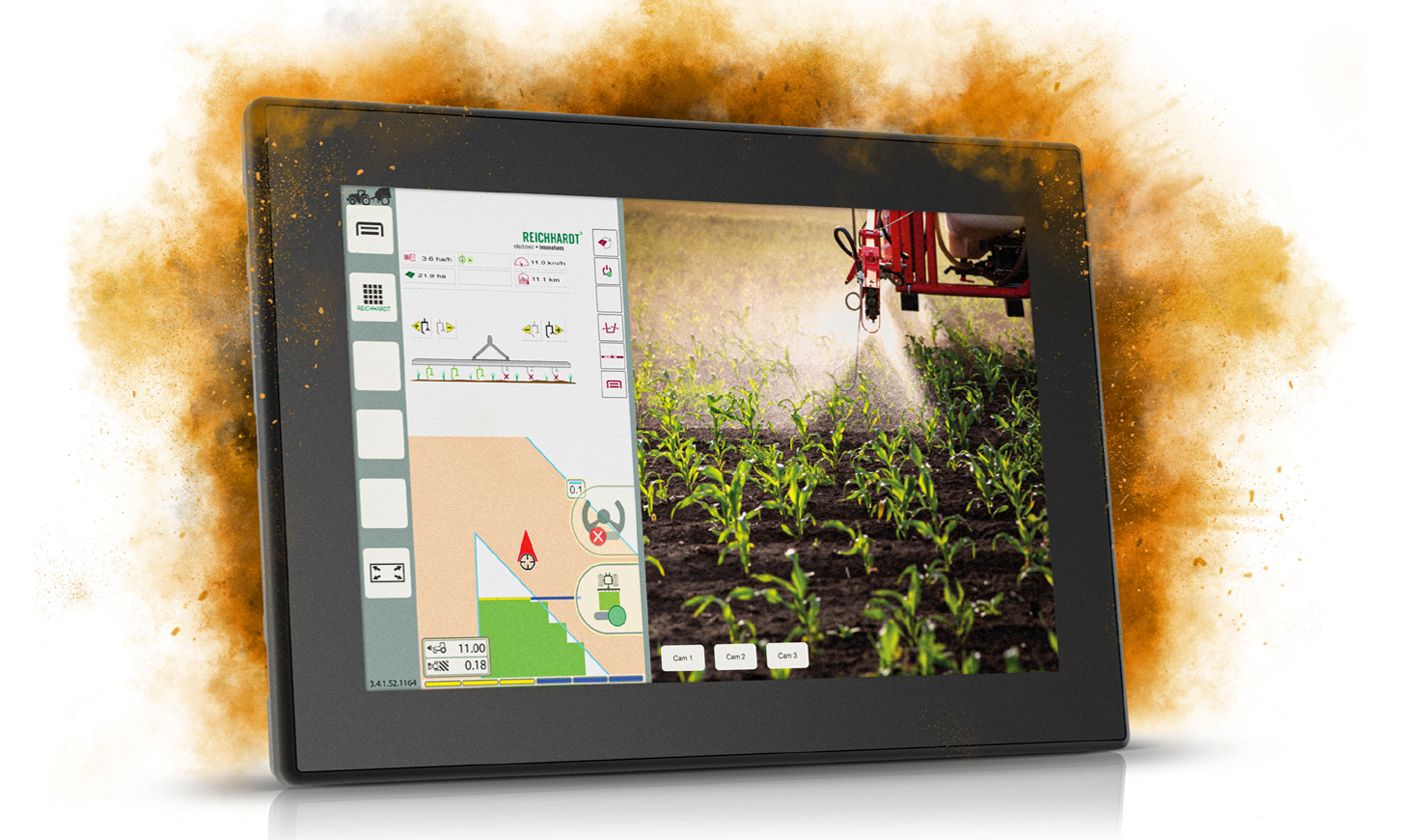Display computer CCpilot V1090 with agricultural GUI in orange dust cloud.