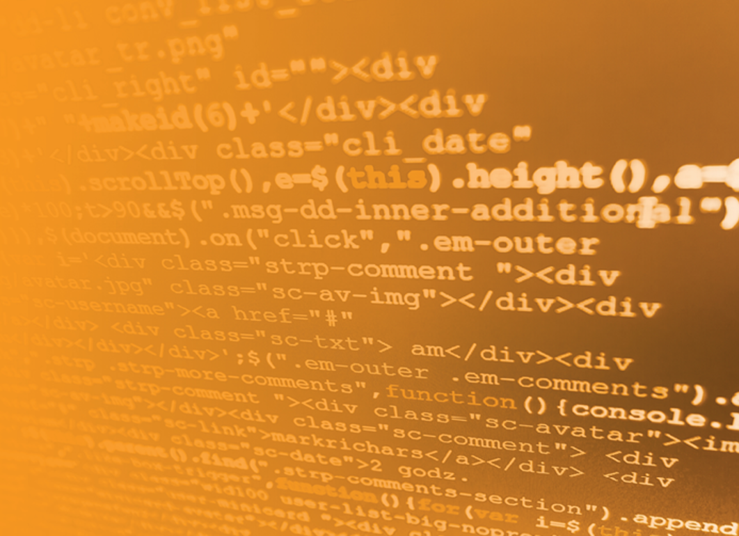 Computer screen with code text in orange