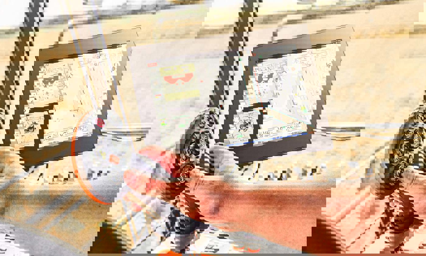 Display computer in agricultural vehicle showing ISOBUS and smart farming.